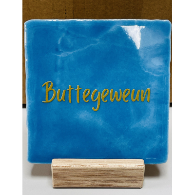 Quote tegel Buttegeweun jeansblauw.
